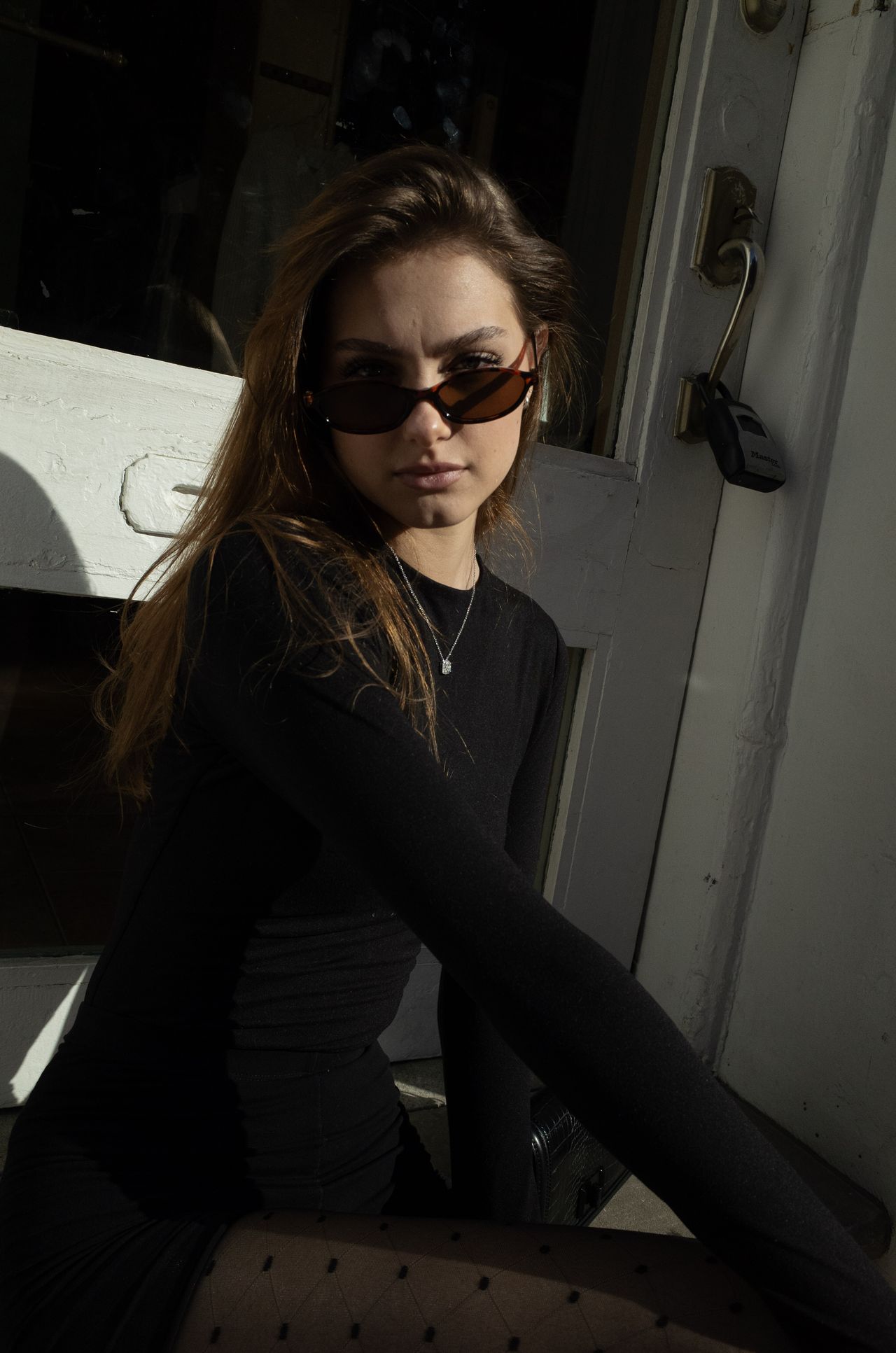 Mia Fantalin, held look in a doorway